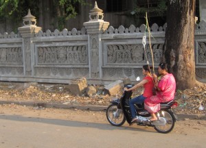 Ken is feeling like a bit of a wimp for complaining about conditions inside a Malaysian hospital. In Cambodia, they plug you in and send you home. Once we realized this, we noticed FIVE mobile IVs in one day in dusty Kratie!