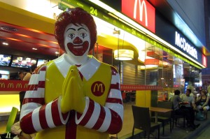 Who says McDonald's isn't culturally sensitive? Ronald says "thank you" in the traditional Thai pose... and serves up the same old greasy food. Not that we would know- we're avoiding the Golden Arches.