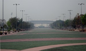 We rode bikes out to Chiang Mai's stadium. The smoky haze is from people burning their fields, garbage, etc. Not conducive to bicycling. >>cough, cough<<