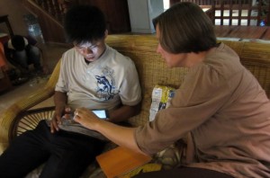 Karen found the last person on earth who hadn't experienced the wonder of the iPad: a Cambodian on staff at our hotel. She cured him of this affliction. Steve Jobs can now rest in peace.